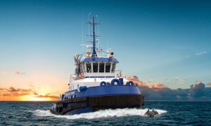 Photography of a tugboat navigates the ocean waters during a stunning sunset, casting warm hues across the sky and sea.